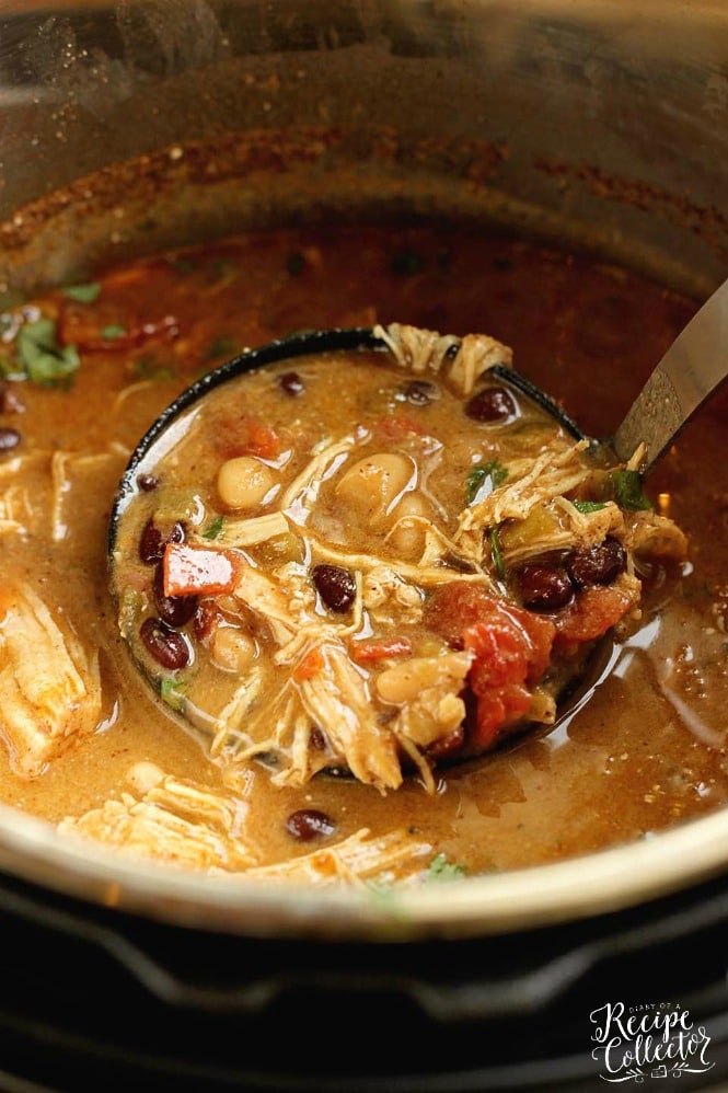 Instant Pot Green Chile Chicken Soup - A quick, easy, and delicious soup recipe filled with beans, green chiles, a little cream cheese, diced tomatoes, and spices.  It's a great weeknight dinner idea and makes several lunches for the week!