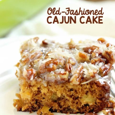 Old-Fashioned Cajun Cake - An EASY cake recipe filled with crushed pineapple and topped with a warm coconut pecan glaze.