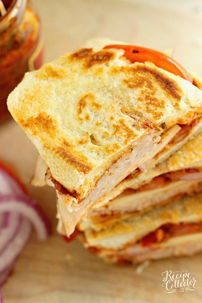 Sun-Dried Tomato Pesto Turkey Panini - An easy grilled sandwich recipe made easy and flavorful with sun-dried tomato pesto.