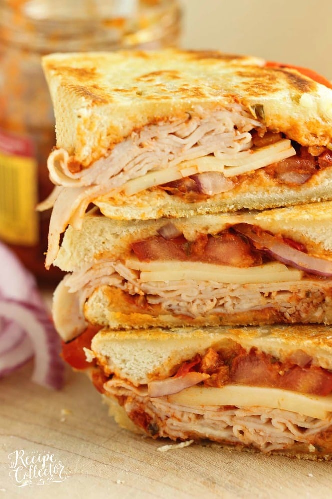 Sun-Dried Tomato Pesto Turkey Panini - An easy grilled sandwich recipe made easy and flavorful with sun-dried tomato pesto.