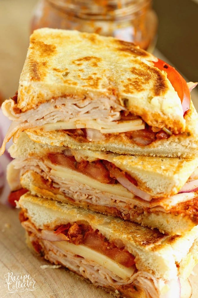 Sun-Dried Tomato Pesto Turkey Panini - An easy grilled sandwich recipe made easy and flavorful with sun-dried tomato pesto.