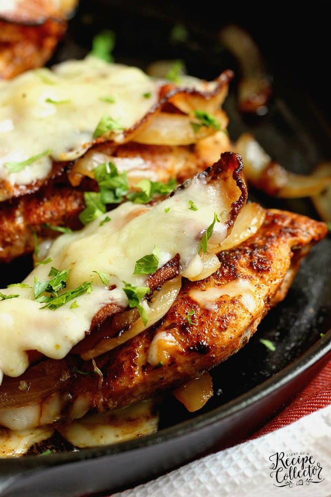 Loaded Blackened Chicken - Seasoned, pan-fried chicken breasts topped with smothered onions, bacon, and pepper jack cheese.  You'll definitely want to make this chicken dinner recipe very soon!