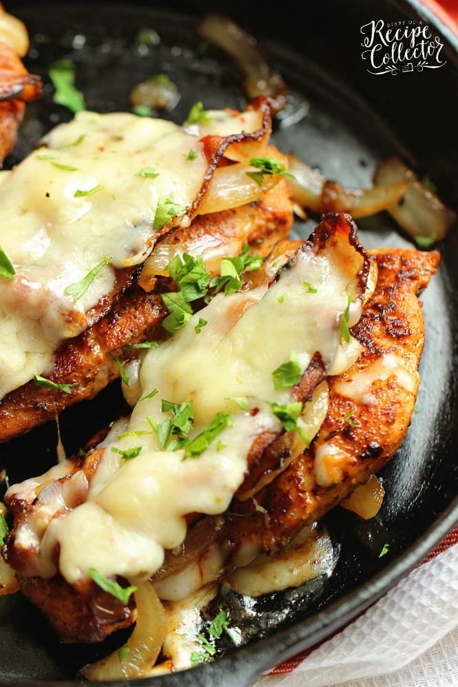 Loaded Blackened Chicken - Seasoned, pan-fried chicken breasts topped with smothered onions, bacon, and pepper jack cheese.  You'll definitely want to make this chicken dinner recipe very soon!