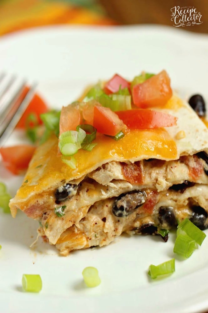 Santa Fe Chicken Enchilada Stack - Creamy chicken enchiladas with black beans made easy! Makes a small portion, so it's perfect for 4! Use shortcut rotisserie chicken to speed things up even more!!