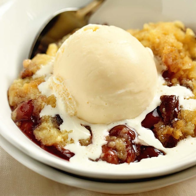 Slow Cooker Cherry Pineapple Dump Cake - No need to turn on the oven!  Let your slow cooker do all the work for this easy dessert recipe that let's you set it and forget it until it's time to eat!