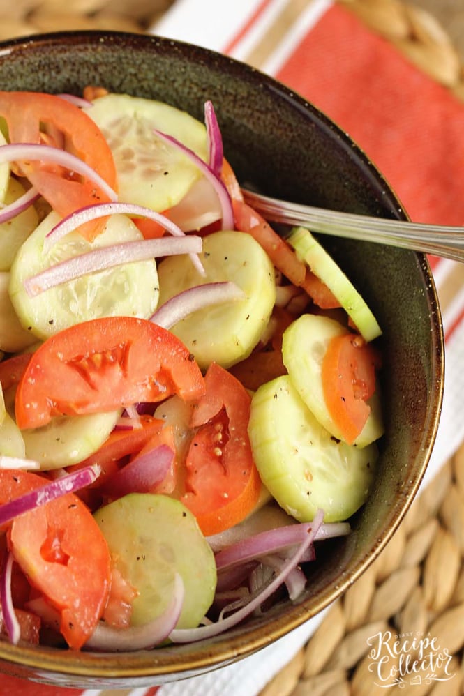 Cucumber, Tomato, and Onion Salad- A wonderful make-ahead salad recipe to use up those fresh garden vegetables!  It makes a great side dish to so many meals!