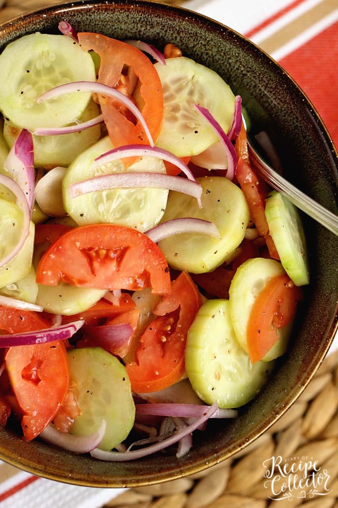 Cucumber, Tomato, and Onion Salad- A wonderful make-ahead salad recipe to use up those fresh garden vegetables!  It makes a great side dish to so many meals!