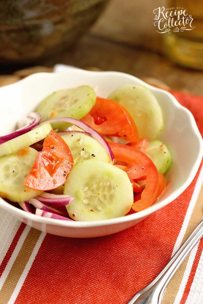 Cucumber, Tomato, and Onion Salad- A wonderful make-ahead salad recipe to use up those fresh garden vegetables!  It makes a great side dish to so many meals!