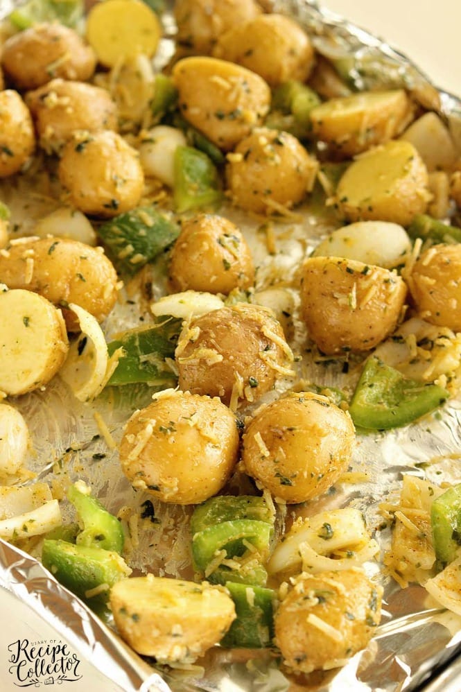 Roasted Creole Potatoes - An easy roasted potato side dish filled with onions, green bell peppers, parmesan cheese, and Creole spices.