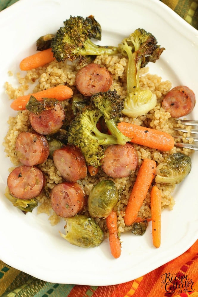 Easy Sheet Pan Sausage and Veggies over Quinoa - A super easy healthy recipe great for make ahead lunches and dinners filled with chicken sausage, veggies, and spices.