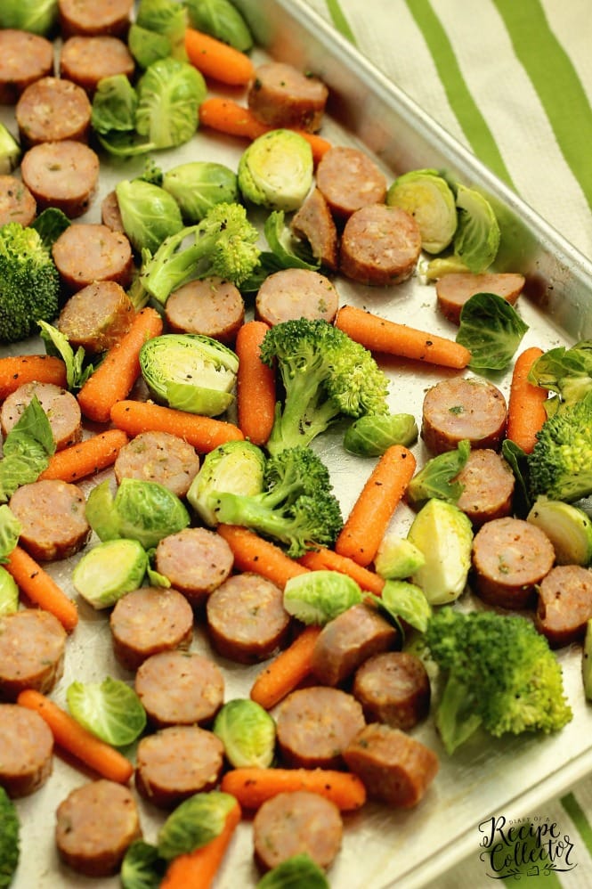 Easy Sheet Pan Sausage and Veggies over Quinoa - A super easy healthy recipe great for make ahead lunches and dinners filled with chicken sausage, veggies, and spices.