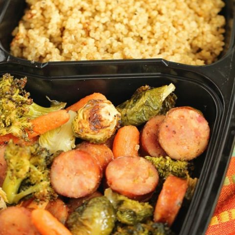 Easy Sheet Pan Sausage and Veggies over Quinoa - A super easy healthy recipe great for make ahead lunches and dinners filled with chicken sausage, veggies, and spices.