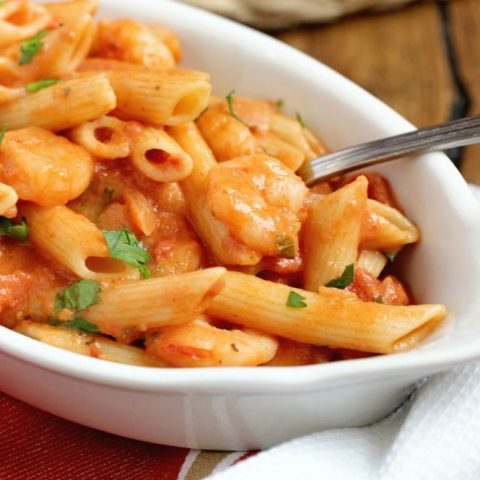 Tomato Basil Shrimp Pasta - A delicious pasta recipe filled with a creamy tomato basil sauce.
