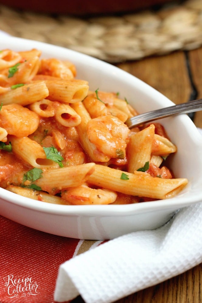 Tomato Basil Shrimp Pasta - A delicious pasta recipe filled with a creamy tomato basil sauce.  