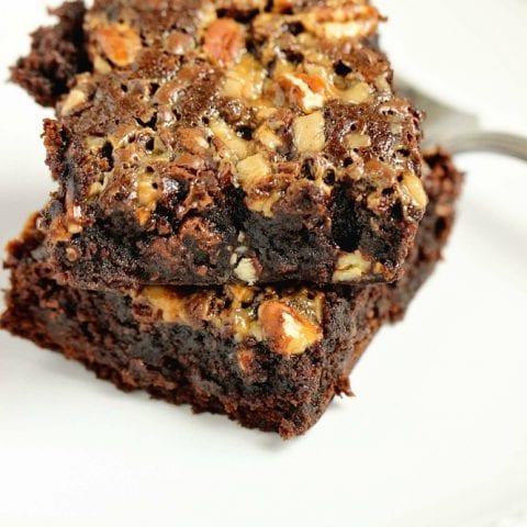 Turtle Brownies - Take your box brownie mix to the next level of good by adding toffee bits, mini chocolate chips,  chopped pecans, and a drizzle of caramel topping.  They are decadent!