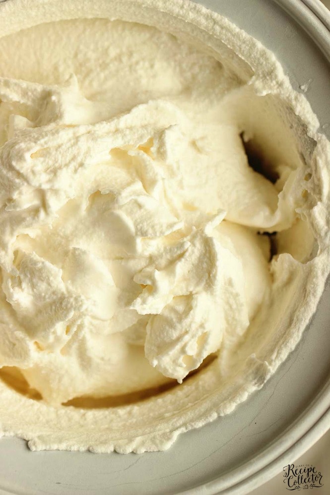 Easy Homemade Vanilla Ice Cream - This easy ice cream recipe is only 5 ingredients and egg-free.  We are making it on repeat around our house all summer!