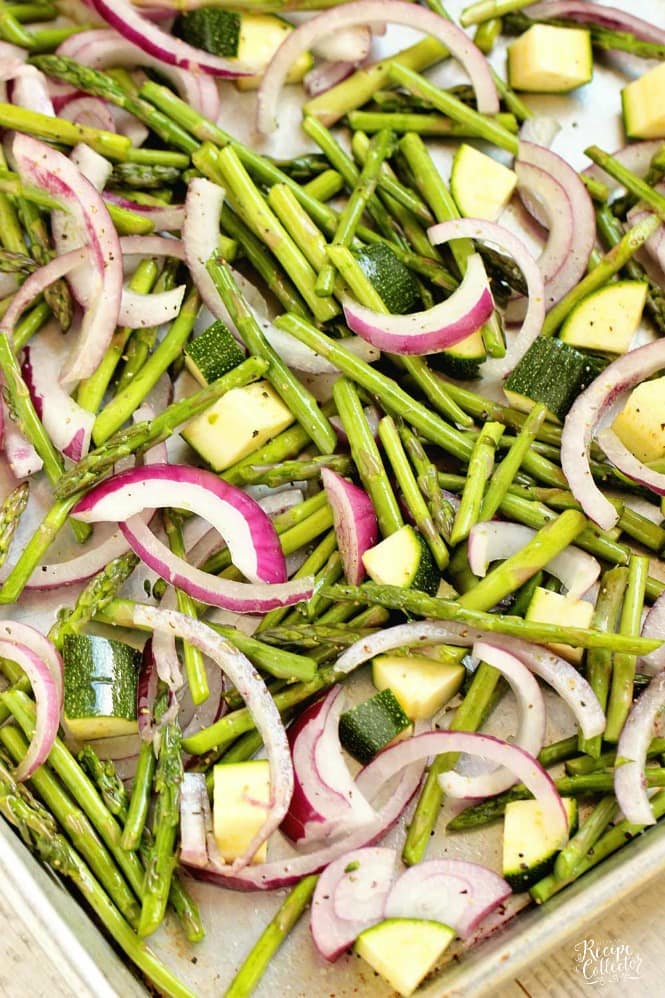 Roasted Vegetable Orzo Salad - Roasted asparagus, red onion, and zucchini tossed with orzo pasta, Italian dressing, balsamic vinegar, and parmesan for an easy flavorful side dish recipe.