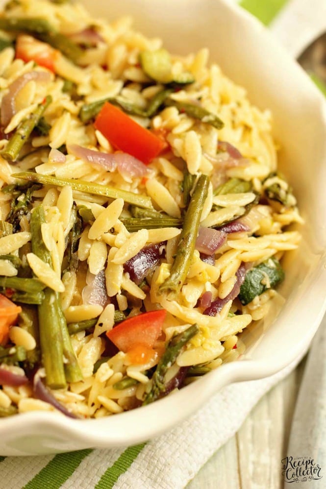 Roasted Vegetable Orzo Salad - Roasted asparagus, red onion, and zucchini tossed with orzo pasta, Italian dressing, balsamic vinegar, and parmesan for an easy flavorful side dish recipe.