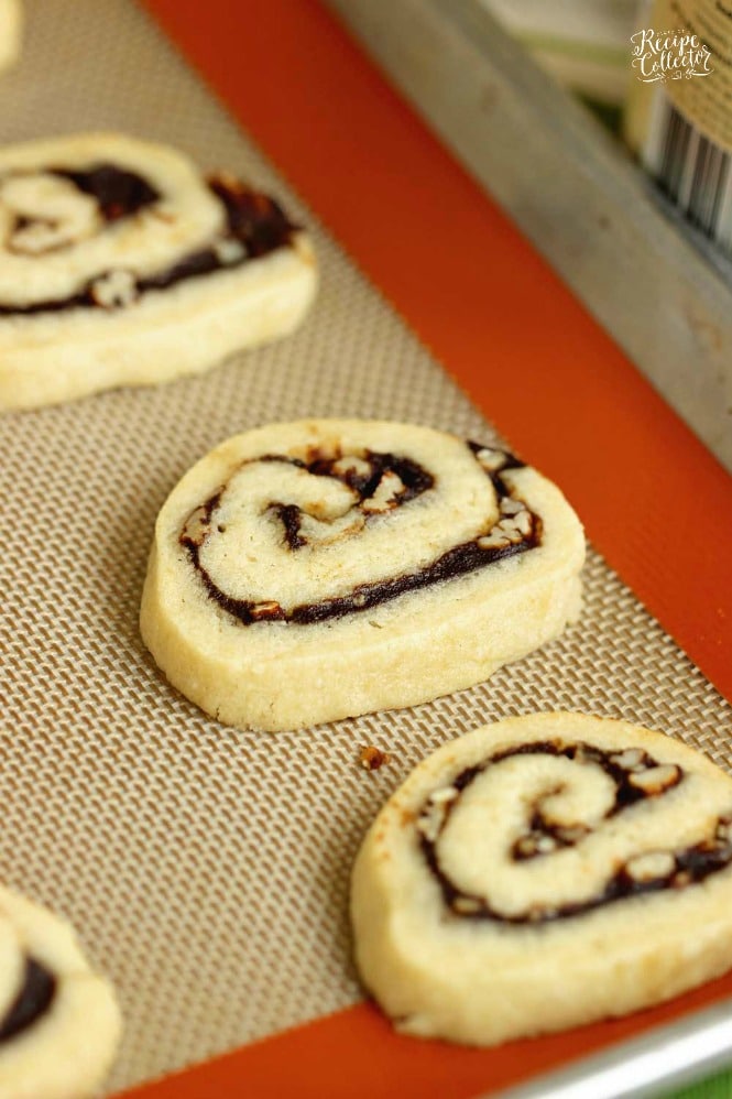 Apple Butter Cinnamon Swirl Cookies - A perfect Fall cookie recipe with an easy homemade dough and a cinnamon sugar apple butter filling.