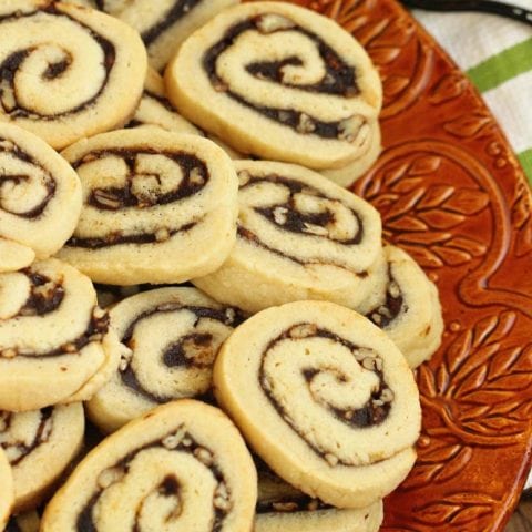 Apple Butter Cinnamon Swirl Cookies - A perfect Fall cookie recipe with an easy homemade dough and a cinnamon sugar apple butter filling.