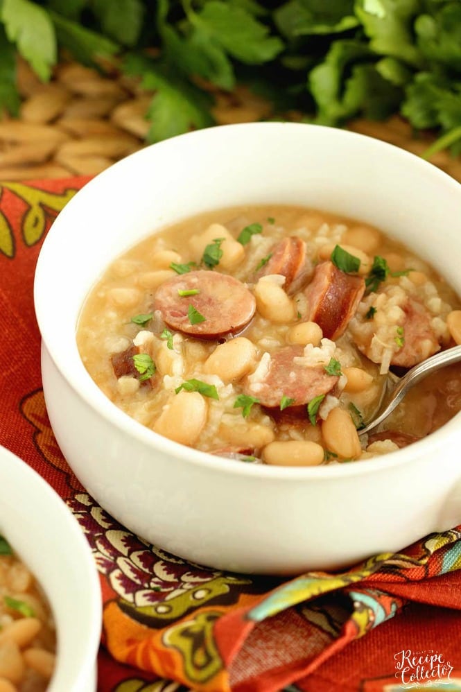 Instant Pot White Beans, Sausage, and Rice - It only takes minutes and a few ingredients to make this easy all in one pot meal filled with smoked sausage, white beans, rice, and some spice.