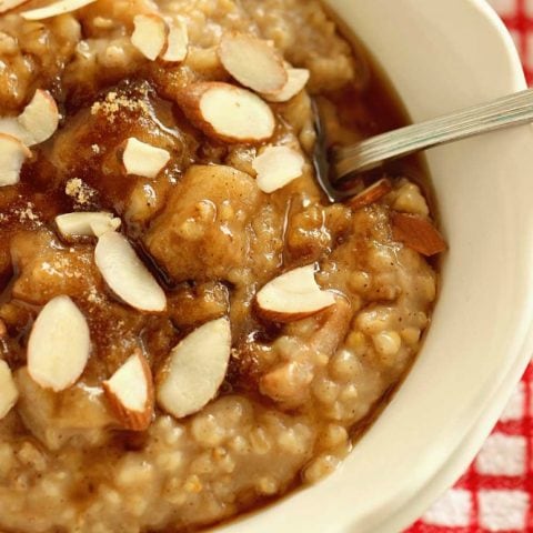 Overnight Slow Cooker Apple Cinnamon Oatmeal - A creamy easy make-ahead breakfast oatmeal recipe.