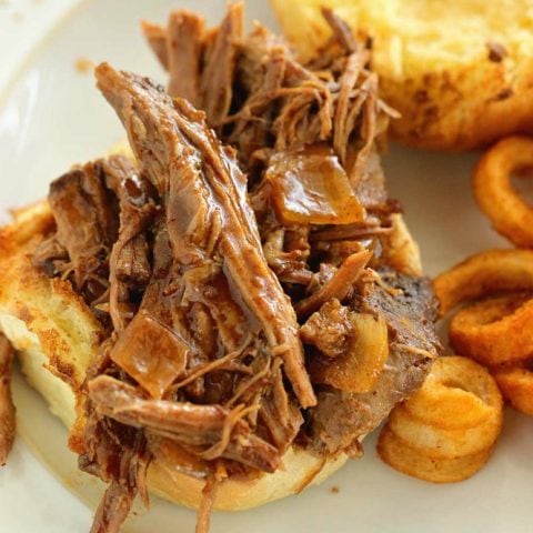 Simple Slow Cooker BBQ Beef Sandwiches - An incredibly easy slow cooker dinner recipe with a simple homemade barbecue sauce that simmers away all day.