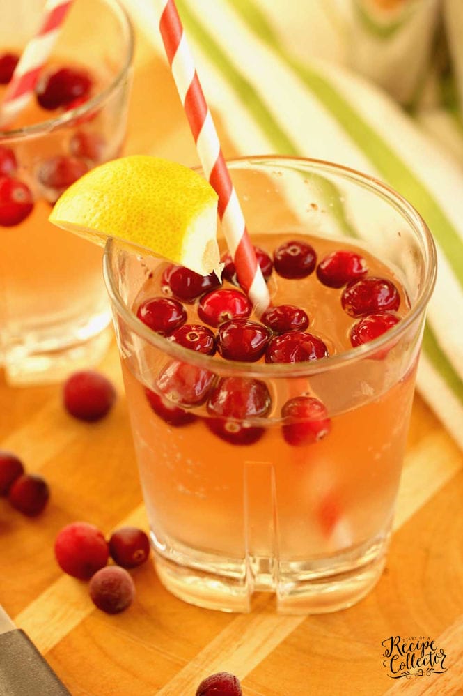 Cranberry Lemonade - An easy and refreshing holiday drink recipe.  Both a cocktail for a few and a large batch non-alcoholic punch recipe are included!