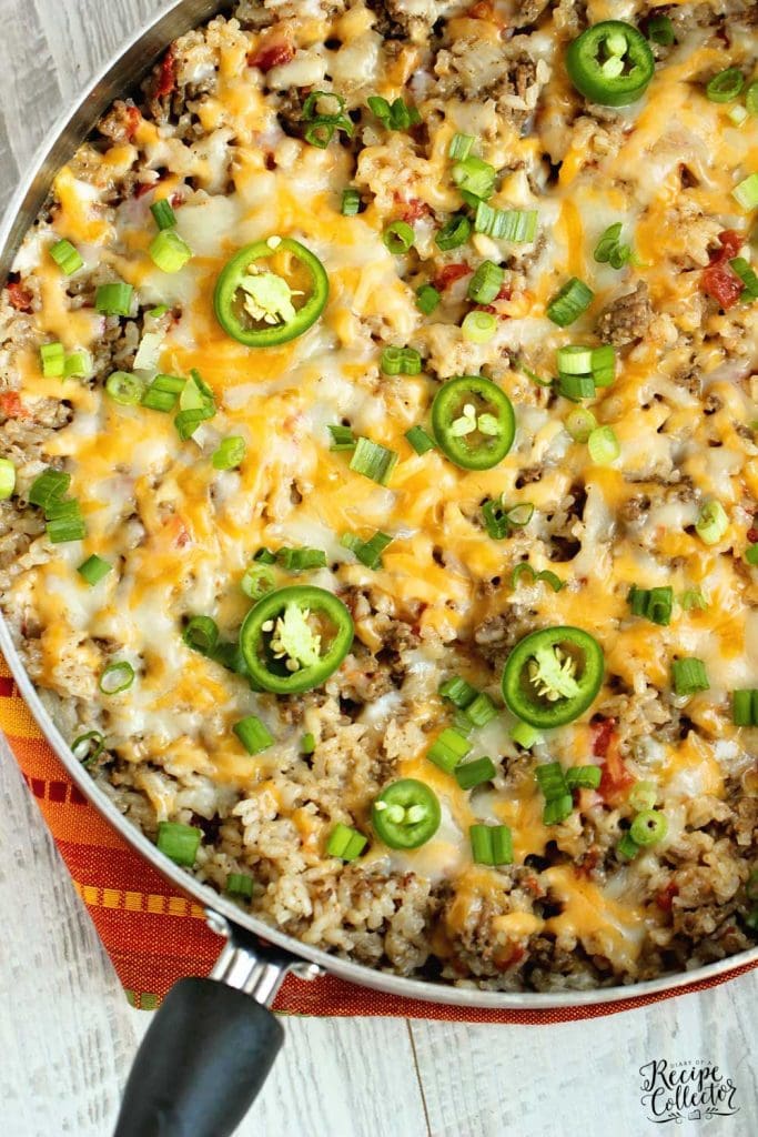 One-Pot Beef Taco Rice - An easy all in one recipe filled with beef, rice, spices, and cheese.  It's a perfect weeknight dinner idea!