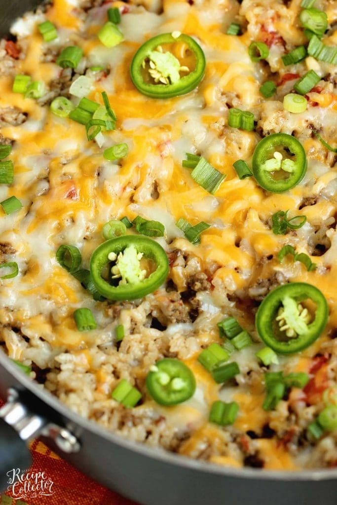 One-Pot Beef Taco Rice - An easy all in one recipe filled with beef, rice, spices, and cheese.  It's a perfect weeknight dinner idea!