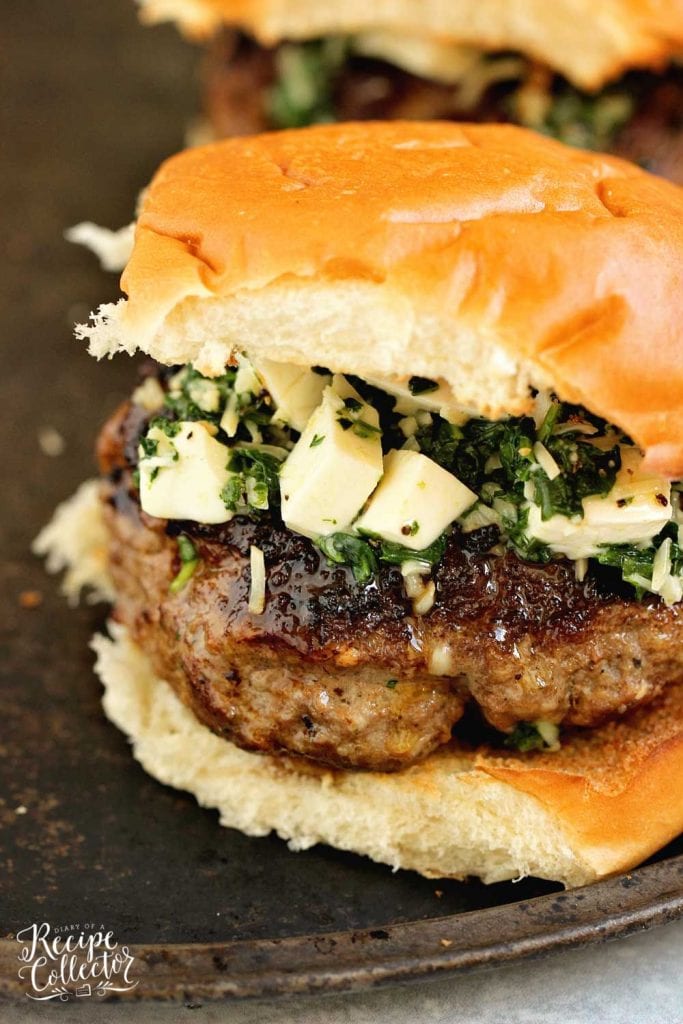 Arugula Spinach Pesto Burgers - Delicious burgers topped with a quick spinach, arugula, parmesan, and mozzarella mix.  These are amazing!