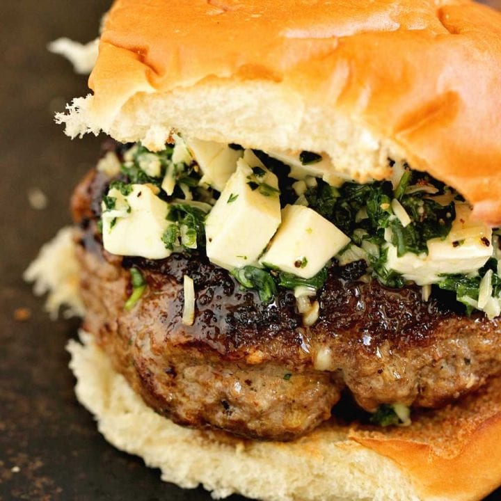 Arugula Spinach Pesto Burgers - Delicious burgers topped with a quick spinach, arugula, parmesan, and mozzarella mix.  These are amazing!