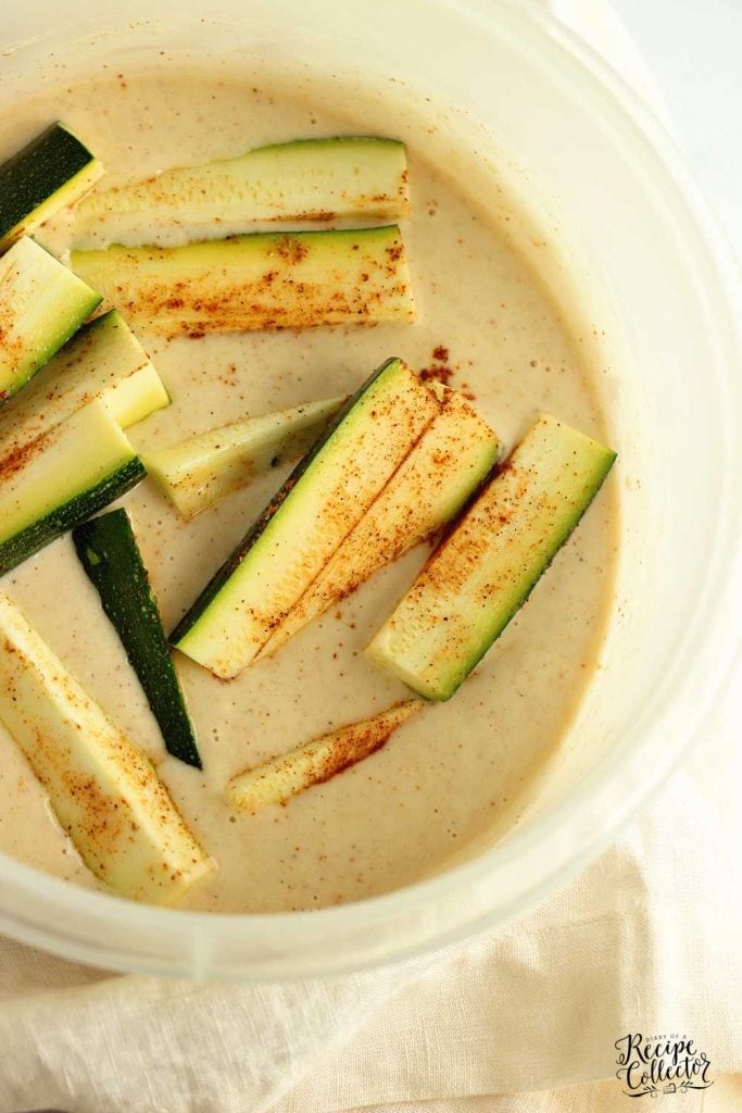 Cajun Fried Zucchini - This easy recipe uses one bowl to prep a delicious cold water Cajun batter.  Serve them warm with your favorite ranch dressing!