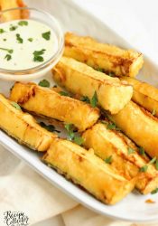 Cajun Fried Zucchini - This easy recipe uses one bowl to prep a delicious cold water Cajun batter.  Serve them warm with your favorite ranch dressing!