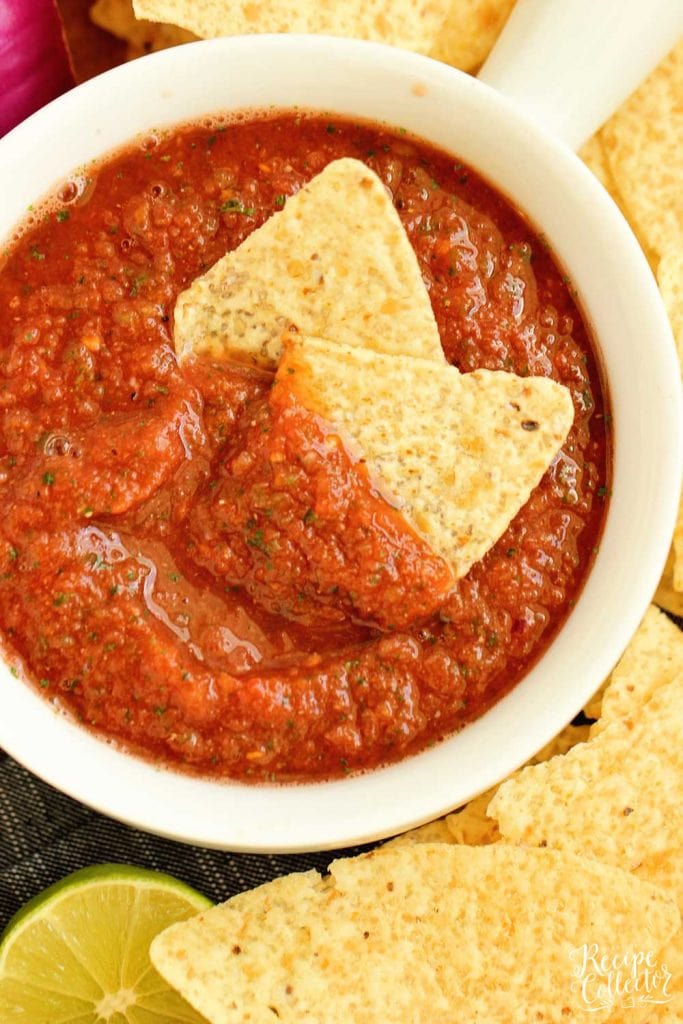 Easy Blender Salsa Recipe - This restaurant-style salsa recipe is so quick and easy and only takes 10 minutes to make!