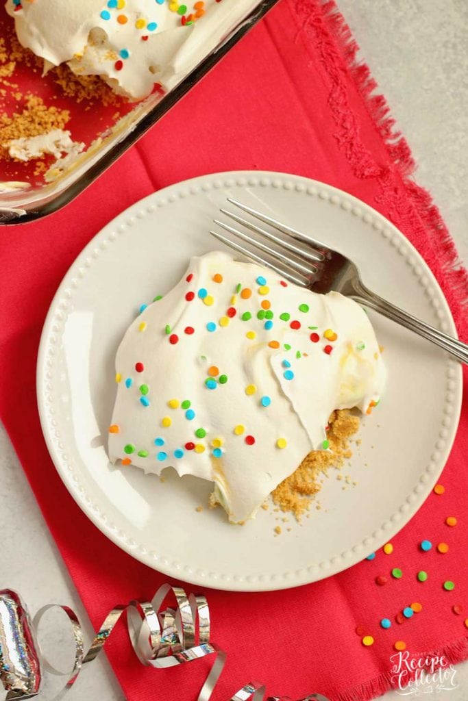 No-Bake Birthday Yummy - Layers of cream cheese pudding and cake batter vanilla pudding piled onto a delicious golden oreo cookie crust!