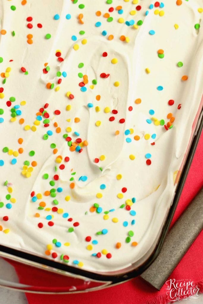 No-Bake Birthday Yummy - Layers of cream cheese pudding and cake batter vanilla pudding piled onto a delicious golden oreo cookie crust!