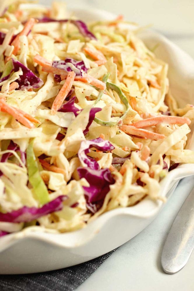 Easy Creole Coleslaw - This quick and easy coleslaw is packed with Cajun Creole flavors and only takes a few ingredients to make!