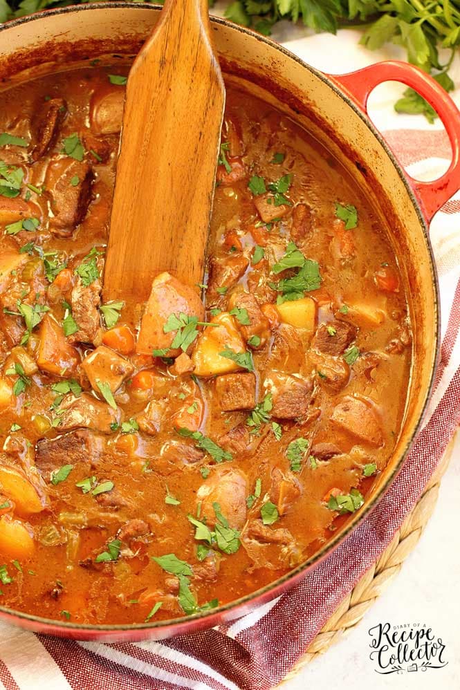 Old-Fashioned Beef Stew - A cozy and hearty stew recipe packed with flavor, topped with crispy bacon, and perfect for those cool nights!