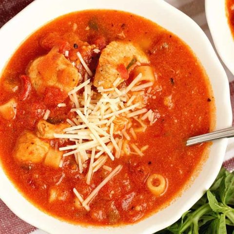 Easy Tomato Basil Chicken Soup - An easy 30 minute comforting soup recipe full of creamy tomato basil flavor.