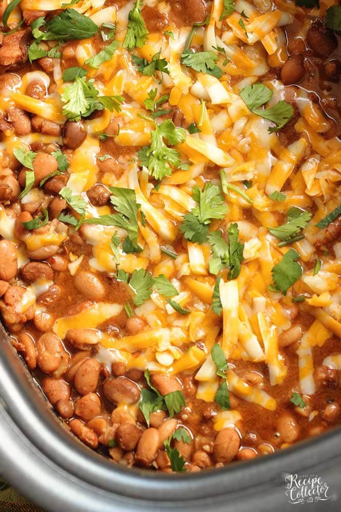 Slow Cooker Mexican Pinto Beans - This is the easiest side dish to all your Mexican themed recipe nights!  Add it to your next Taco Tuesday or Fajita Friday!