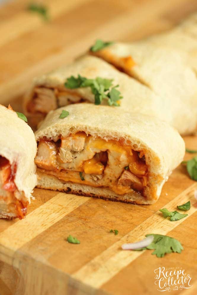 BBQ Chicken Roll-Up - An easy meal idea using refrigerated pizza dough, grilled chicken, your favorite barbecue sauce, cheddar, cilantro, and red onion. 