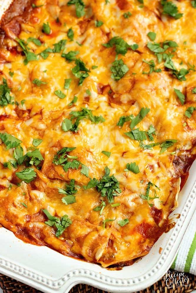 Baked Enchilada Casserole - A total crowd pleasing Mexican casserole recipe filled with layers of white corn tortillas, enchilada sauce, refried beans, meat sauce, and shredded cheese.  Plus, it has a little secret ingredient to give it that great flavor! 