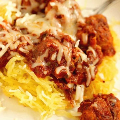 Skinny Chicken Parmesan Meatballs - A low-carb, low-calorie delicious dinner recipe and served over roasted spaghetti squash!