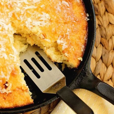 Easy Lemon Coconut Skillet Cake - All lemon lovers will delight in this easy recipe with an extra lemony flavor and soaked in a sweet lemon coconut glaze.