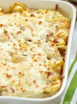 Easy Chicken Tortellini Pasta Bake - A quick creamy pasta recipe filled with a delicious homemade basil Alfredo sauce, cheese tortellini, rotisserie chicken, and shredded mozzarella cheese.
