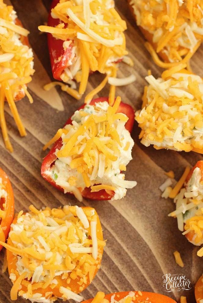 Stuffed Ranch Cream Cheese Mini Peppers - These make a great party appetizer! They are stuffed with a spicy veggie ranch cream cheese which pairs perfectly with the sweet peppers.