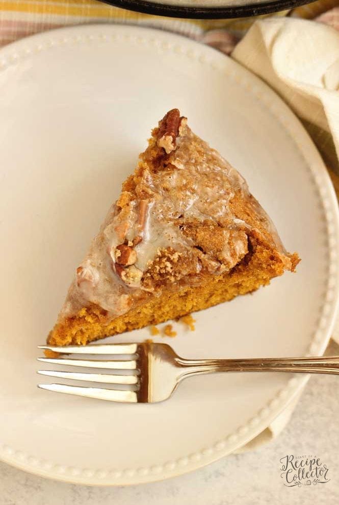 Easy Pumpkin Skillet Coffee Cake - An easy pumpkin recipe perfect for fall. It comes together in one bowl and then it's topped with a sugared pecan topping and an easy glaze.