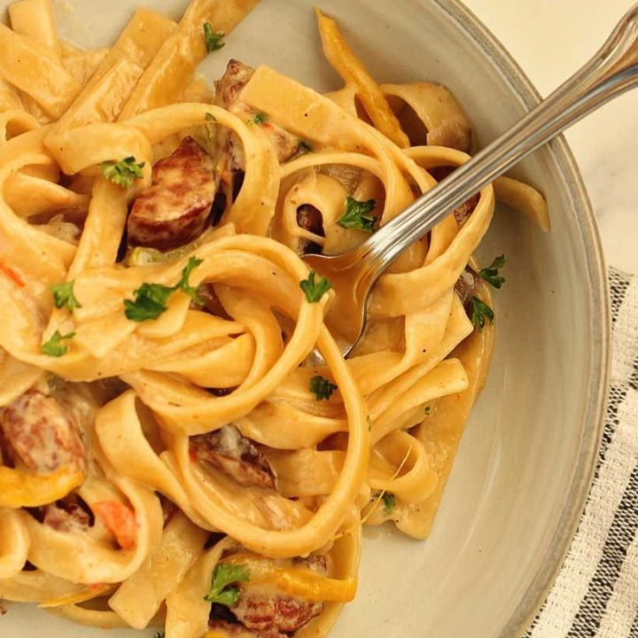 This One Pot Creamy Cajun Sausage Pasta is rich, flavor-packed, and ready fast. Smoky sausage and creamy parmesan sauce make it a weeknight favorite.