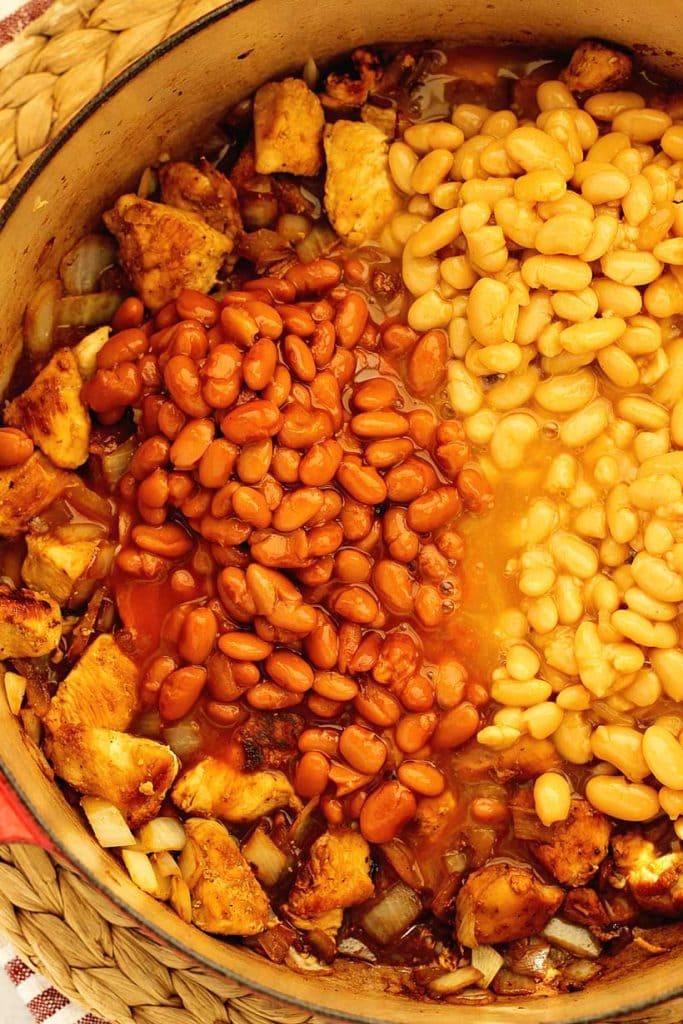 Creamy chicken soup with beans and melty cheese made in one pot. This hearty, high fiber easy soup recipe is ready in 30 minutes and perfect for busy nights.